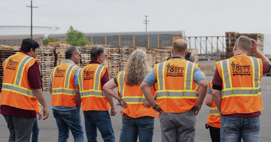 photo of 48forty employees in safety vests at plant