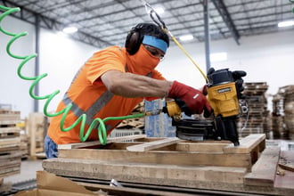 48forty employee building a custom pallet